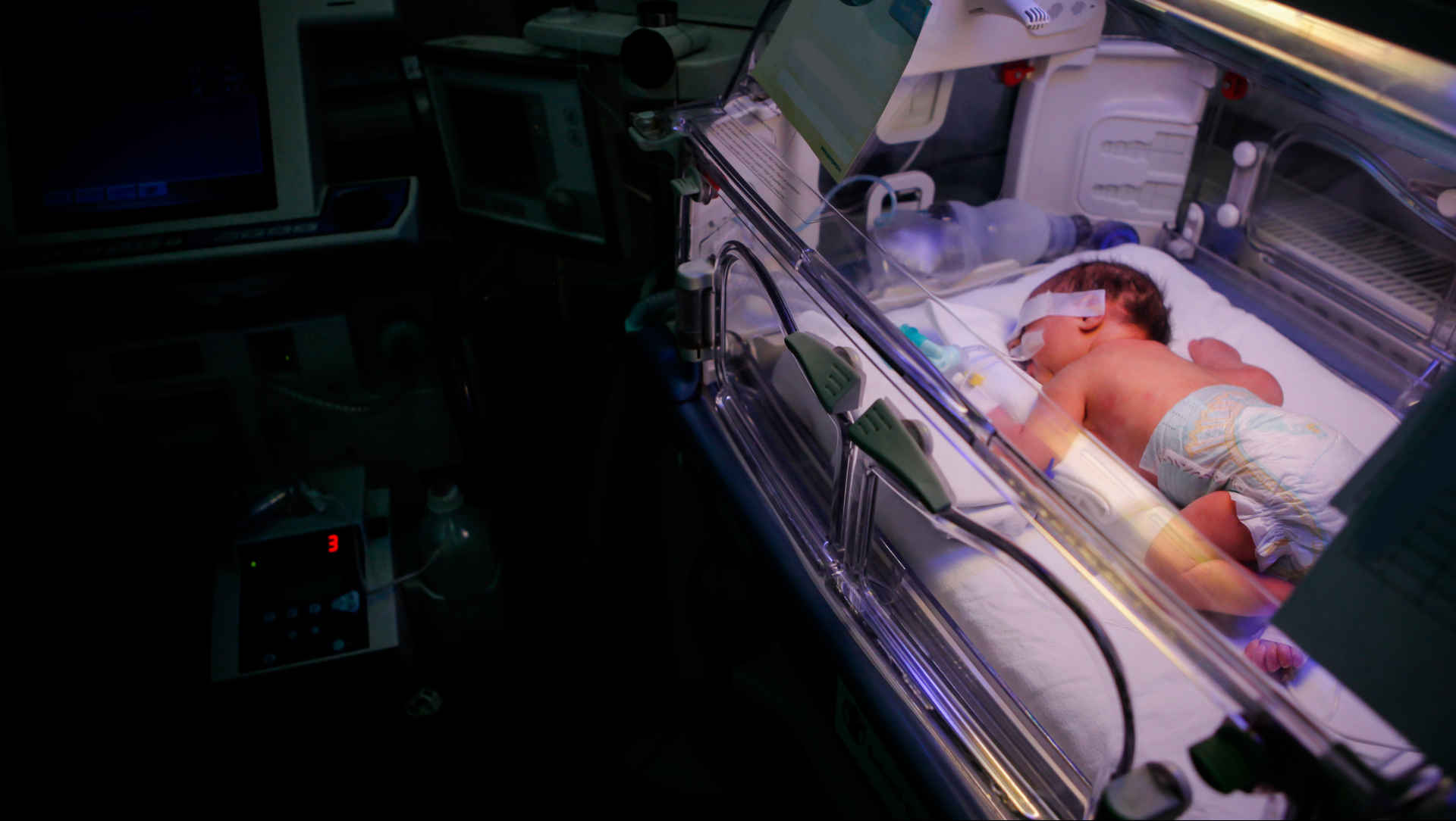Child having his lungs auscultated